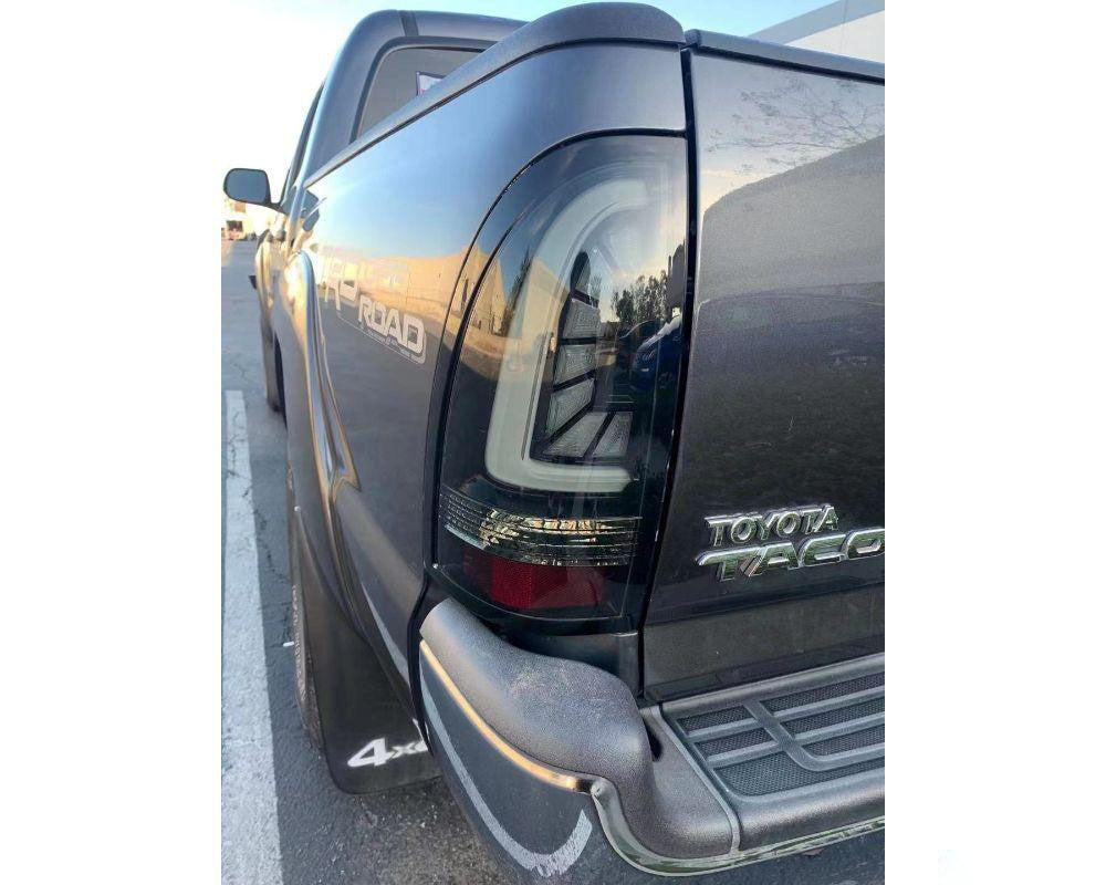 Pro-series Tail Lights Jet Black Alpharex for 2005–2015 Toyota Tacoma